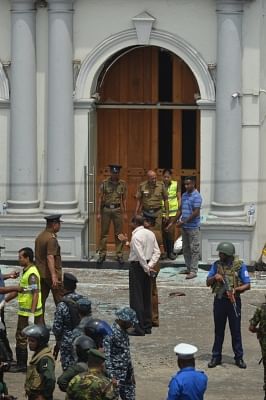Colombo, April 21, 2019 (Xinhua) -- People gathered outside the Church of St. Anthony where the explosion occurred in Colombo, Sri Lanka, April 21, 2019. At least 50 people were killed and more than 100 others injured in multiple church and hotel blasts in Sri Lanka, police said on Sunday. (Xinhua/Tang Lu/IANS)