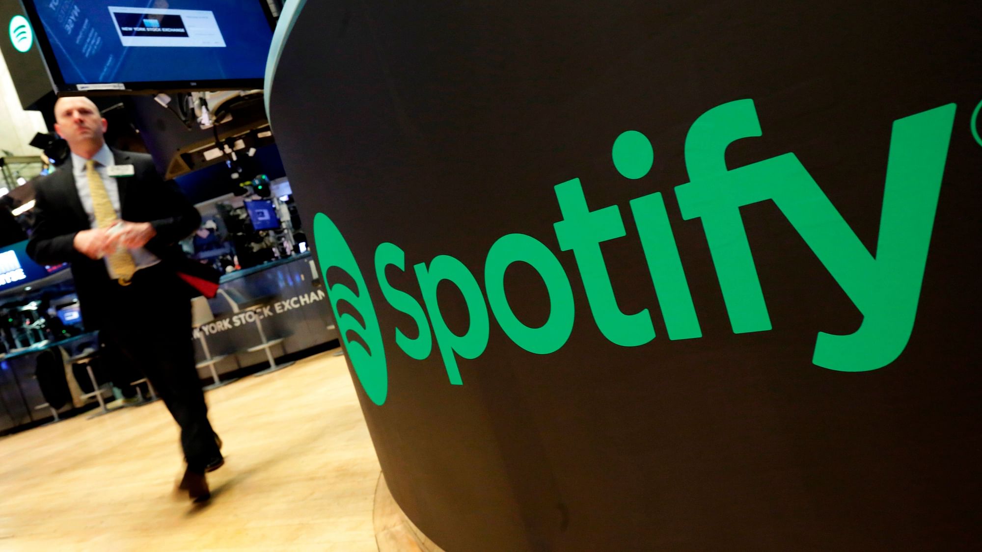 Music streaming service Spotify says the number of its paying subscribers has hit 100 million for the first time.