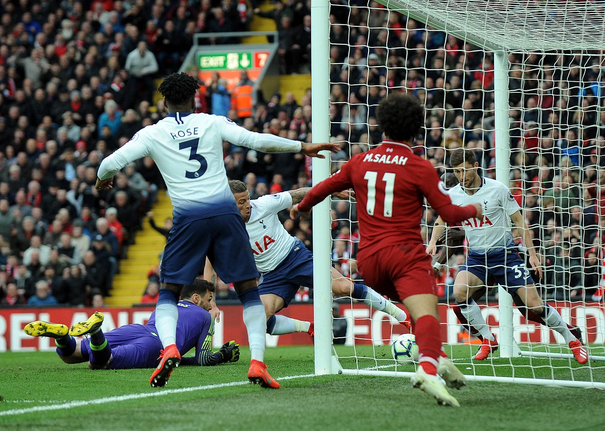 Tottenham’s Toby Alderweireld, center, scores an own goal past his goalkeeper during the English Premier League soccer match.