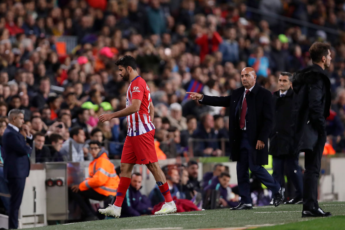 Costa was shown a red card in the first half of Atletico’s 2-0 loss to Barcelona.