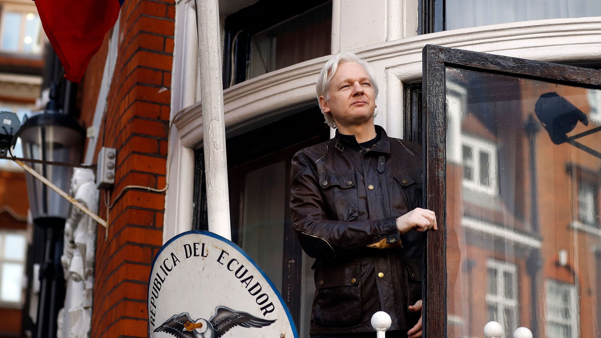  WikiLeaks founder Julian Assange greets supporters outside the Ecuadorian embassy in London.&nbsp;