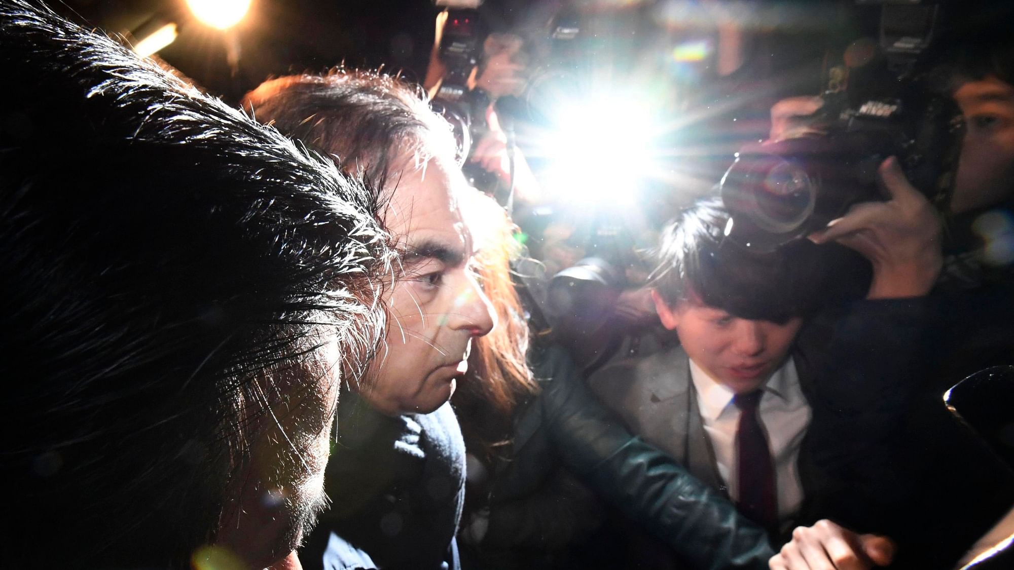 Nissan chief Carlos Ghosn being taken into custody in Japan’s Tokyo.