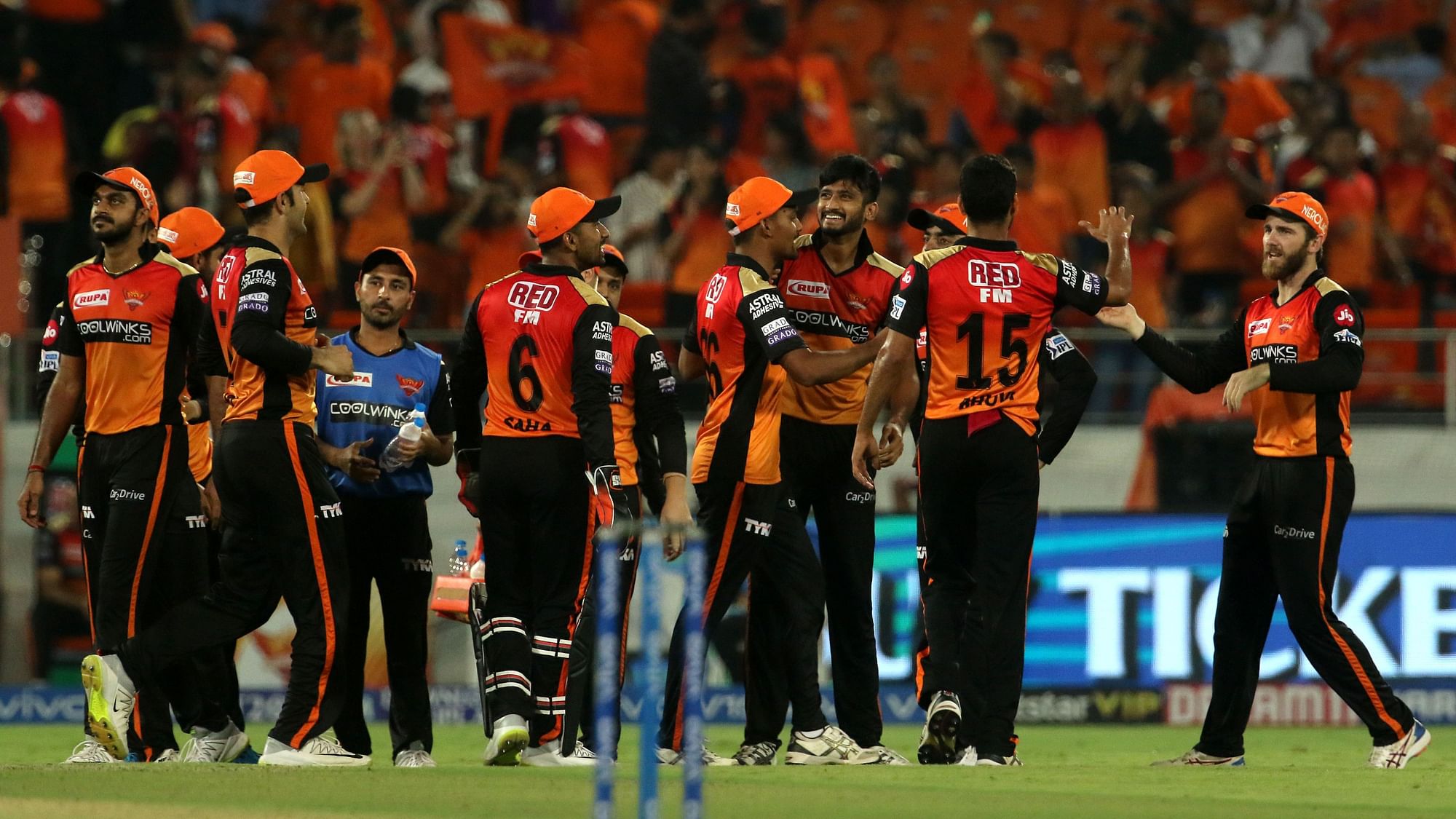 Sunrisers Hyderabad players celebrate a wicket against Kings XI Punjab.