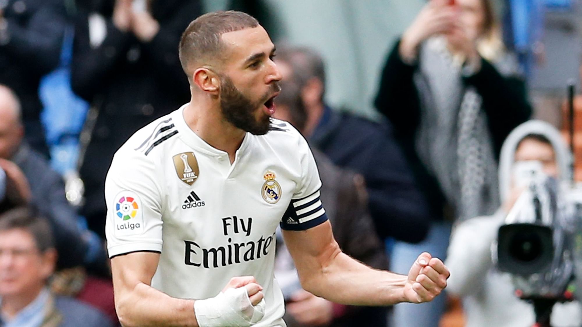 Real Madrid’s Karim Benzema celebrates after he scored his side’s second goal during a Spanish La Liga soccer match between Real Madrid and Eibar at the Santiago Bernabeu stadium in Madrid, Spain, Saturday April 6, 2019.&nbsp;