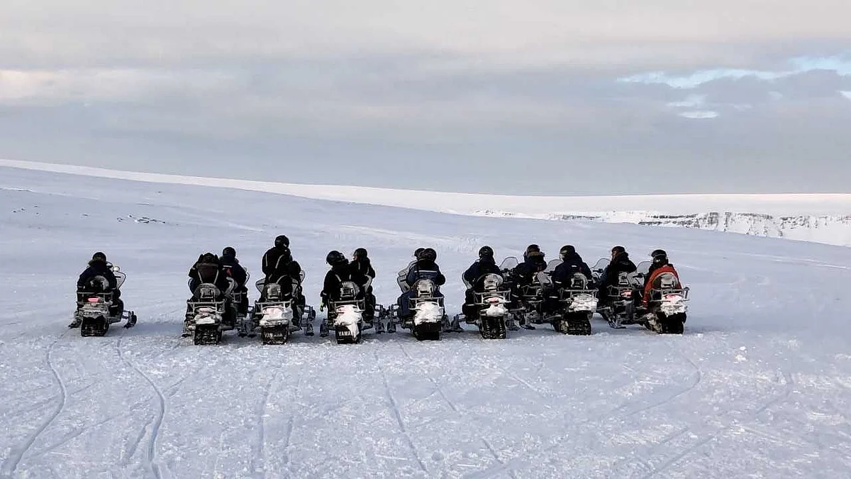Snowmobiling on a glacier.