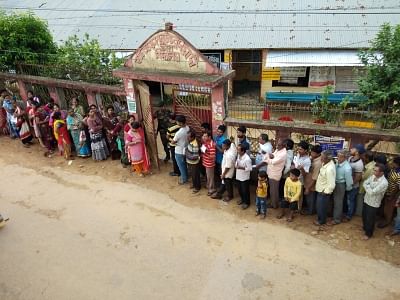 Agartala: People queue up early morning to cast their vote at a polling centre in Agartala April 11, 2019. (Photo: IANS)