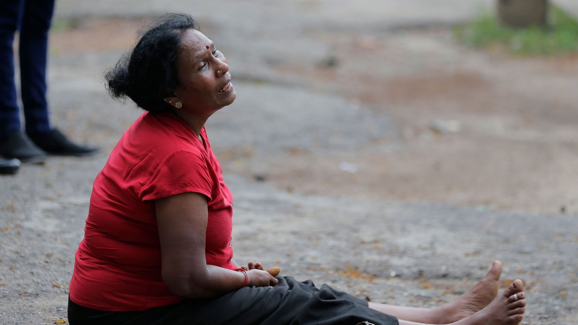 A relative of a blast victim grieves outside a morgue in Colombo, Sri Lanka. More than a hundred were killed and hundreds more hospitalised with injuries from eight blasts that rocked churches and hotels in and just outside of Sri Lanka’s capital on Easter Sunday.
