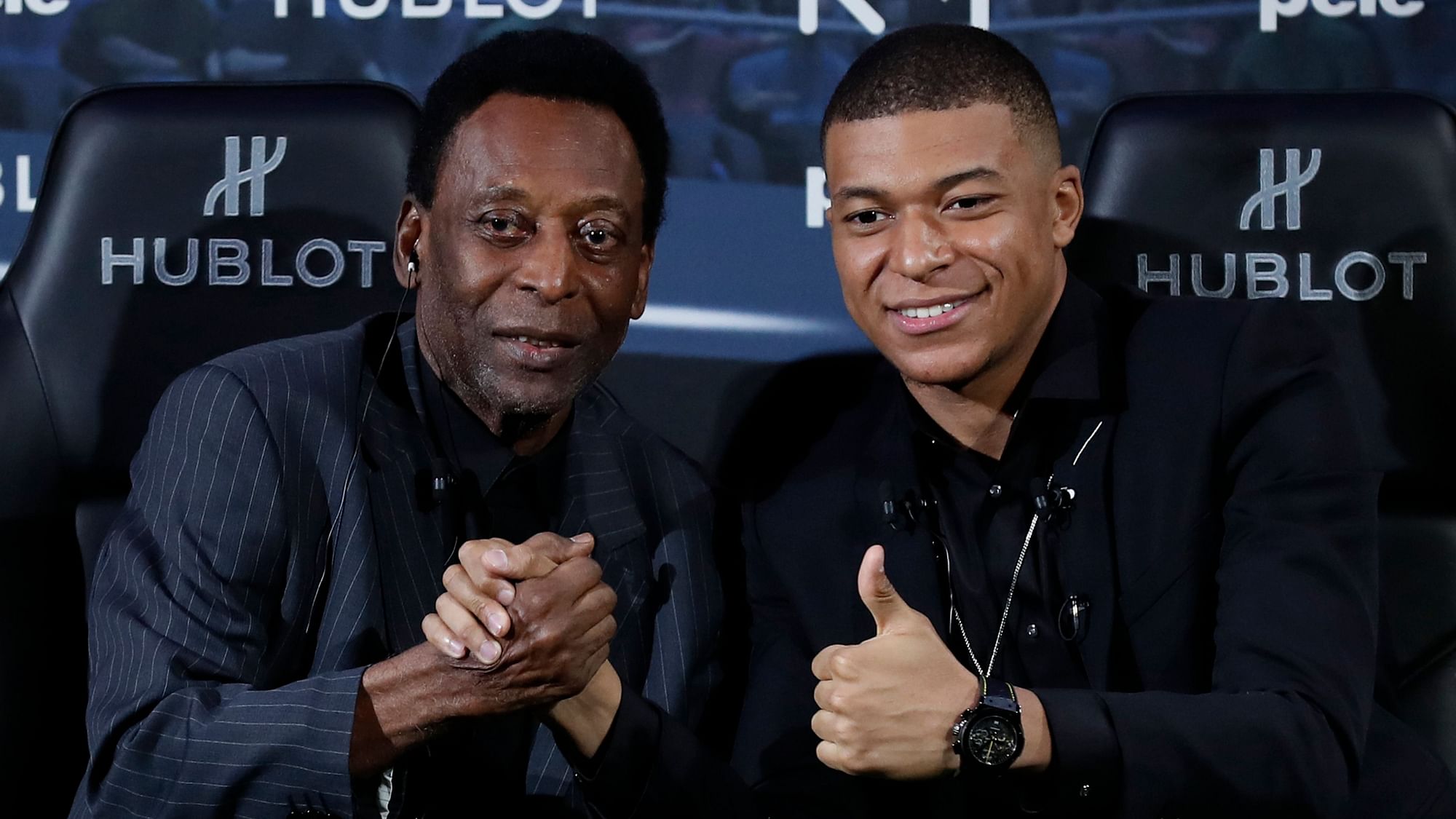 Brazilian soccer legend Pele, left, and French soccer player Kylian Mbappe pose during a photocall in Paris, Tuesday, April 2, 2019.&nbsp;
