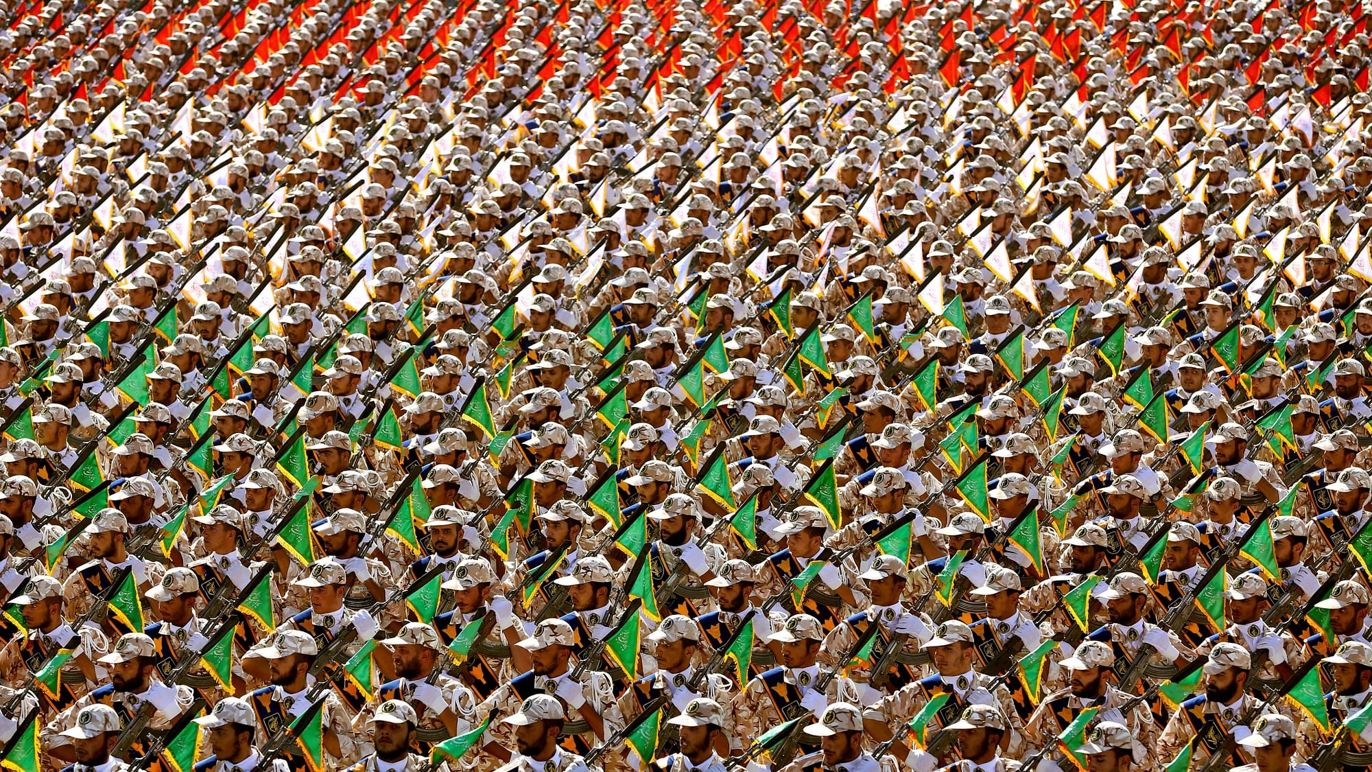 Members of the Iran’s Revolutionary Guard march during an annual military parade at the mausoleum of Ayatollah Khomeini, outside Tehran, Iran.