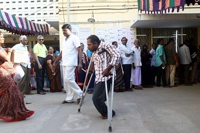 Chennai: A differently able voter arrives to cast his vote for the second phase of 2019 Lok Sabha elections in Chennai on April 18, 2019. (Photo: IANS)