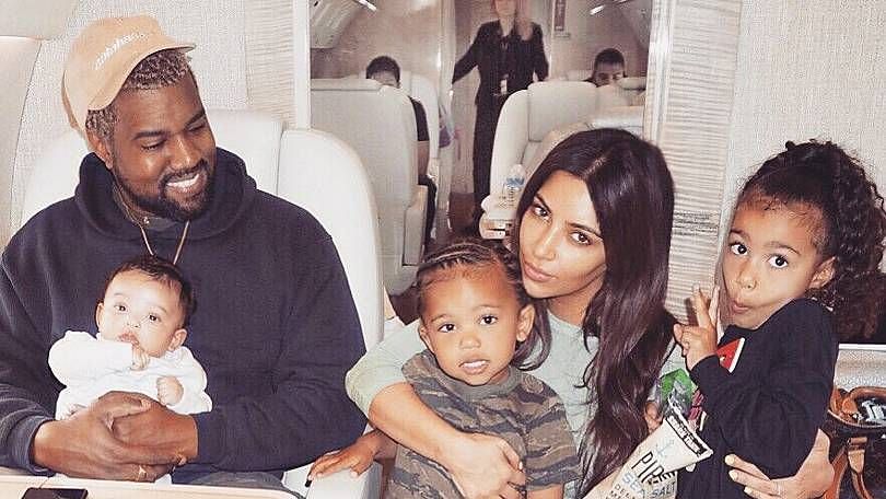 Kim Kardashian with hubby Kanye West and all their kids. From L to R, Chicago, Saint, North.