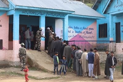 Kupwara: People wait in a queue to cast their votes for the first phase of 2019 Lok Sabha elections, at a polling booth in Jammu and Kashmir