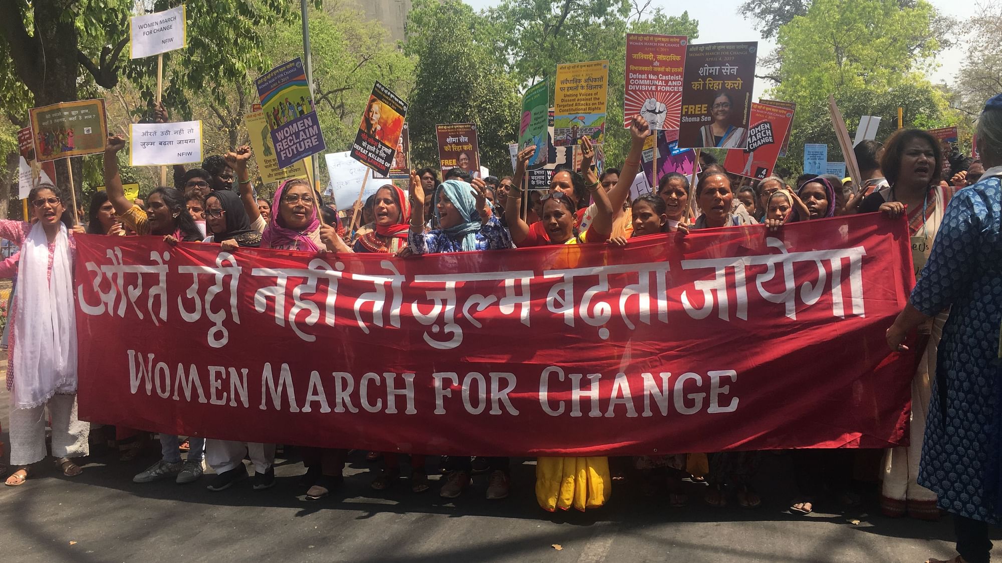 Women raising slogans in solidarity for the Women March for Change