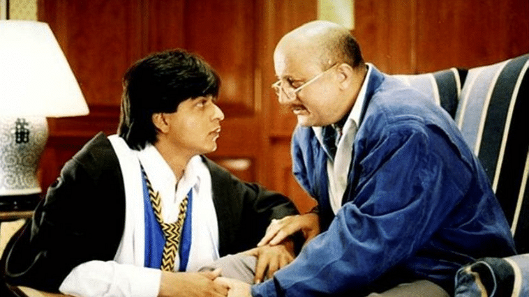 Shah Rukh Khan and Anupam Kher in DDLJ.