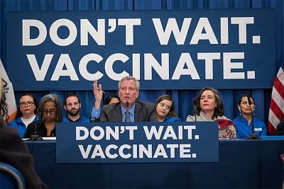 New York Mayor Bill de Blasio, center, announces the declaration of a health emergency because of the spread of measles. (Photo: Mayor