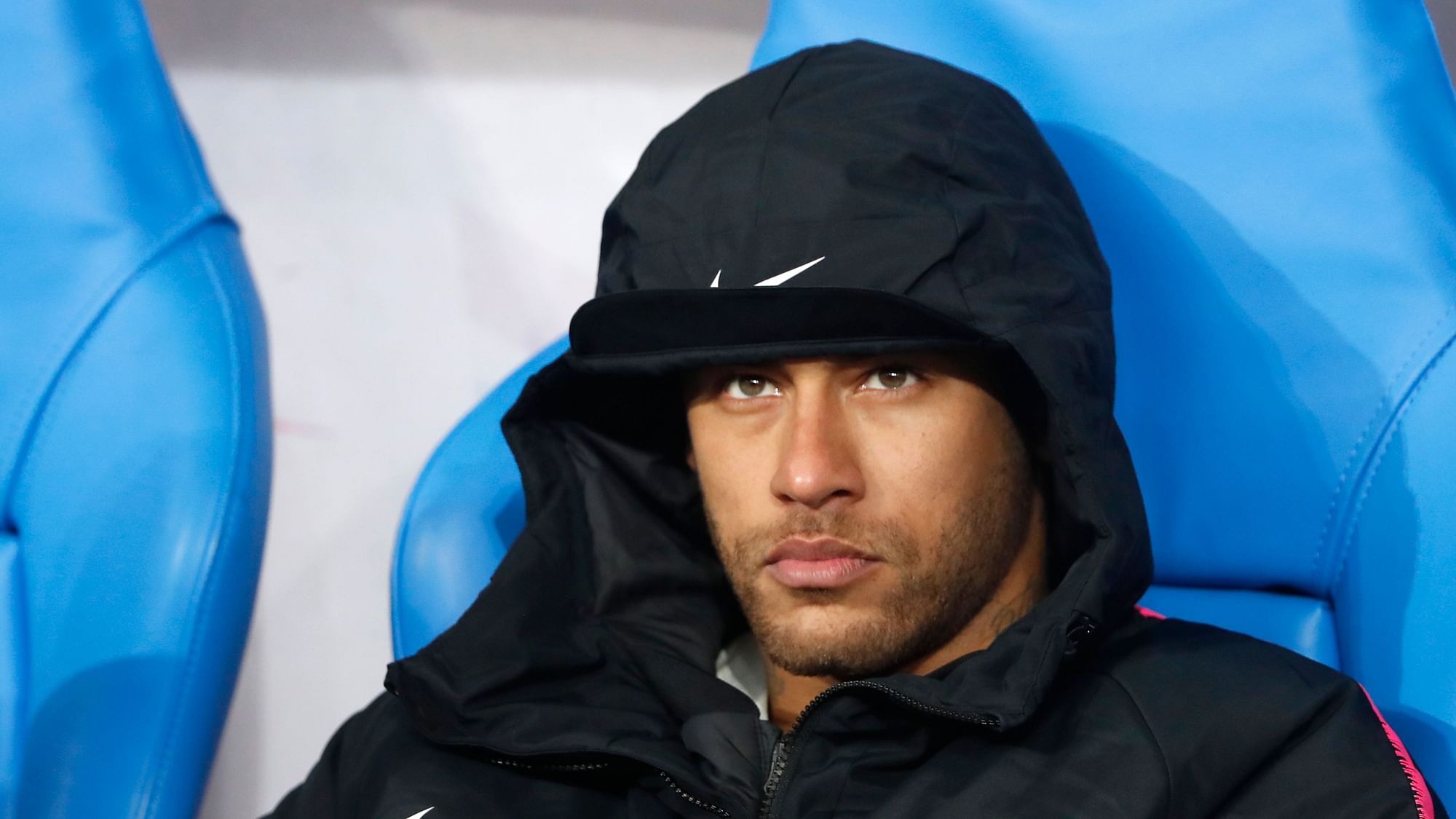 Neymar appeared to aim a punch at a fan goading him and other Paris Saint-Germain players with provocative language.