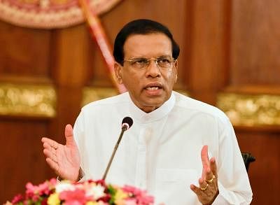 COLOMBO, July 15, 2015 (Xinhua) -- Sri Lankan President Maithripala Sirisena makes a special statement to media in Colombo, Sri Lanka, on July 14, 2015. Sri Lankan President Maithripala Sirisena on Tuesday said that he was against former President Mahinda Rajapaksa being given nominations from his party to contest the Aug. 17 parliamentary elections.   (Xinhua/Easwaran/IANS)