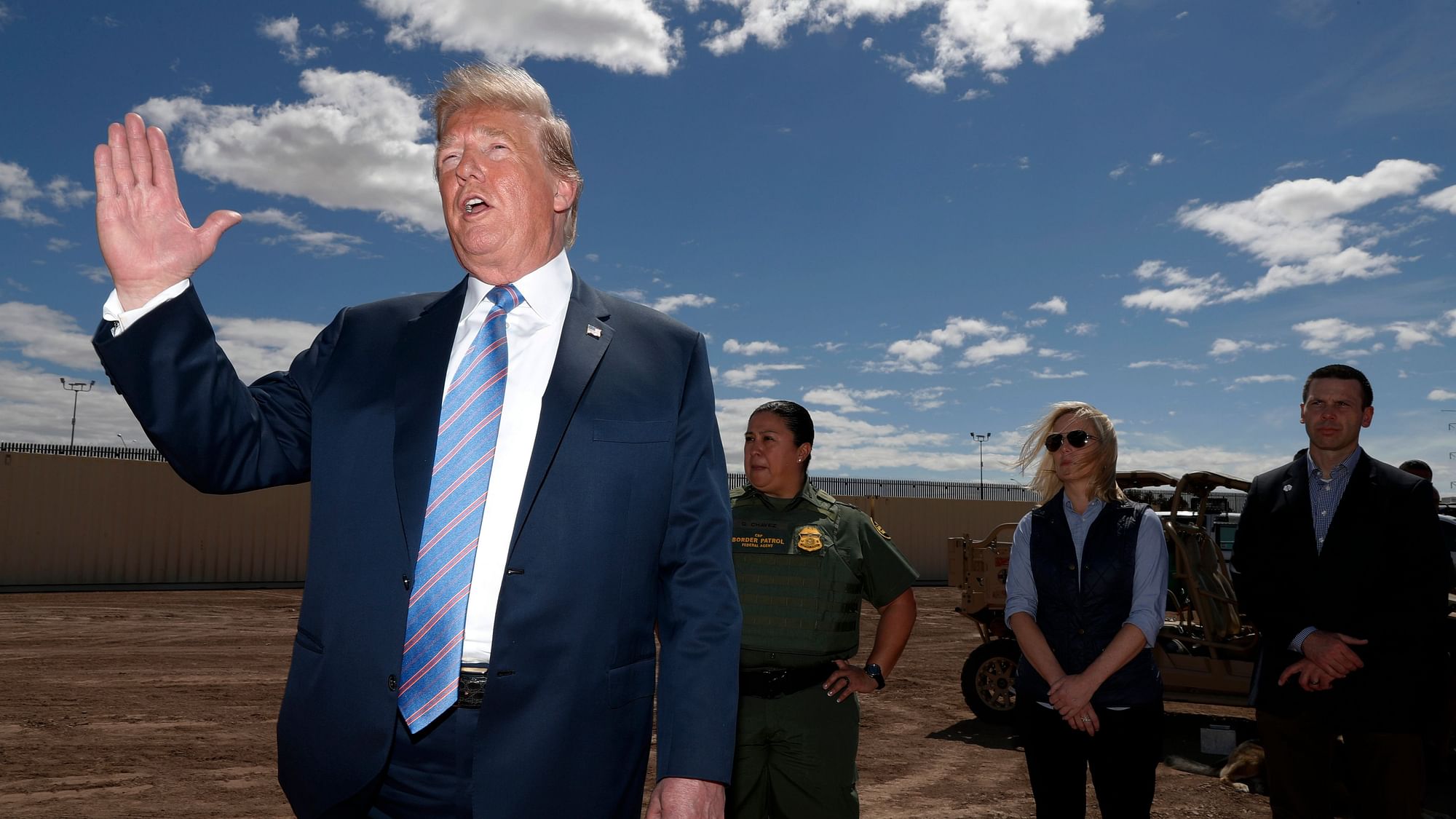 President Donald Trump visits a new section of the border wall with Mexico in Calexico, California.