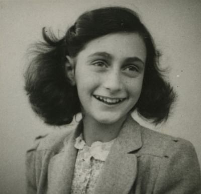 Passport photo Anne Frank, May 1942. (Photo collection Anne Frank House, Amsterdam. Public Domain Work)