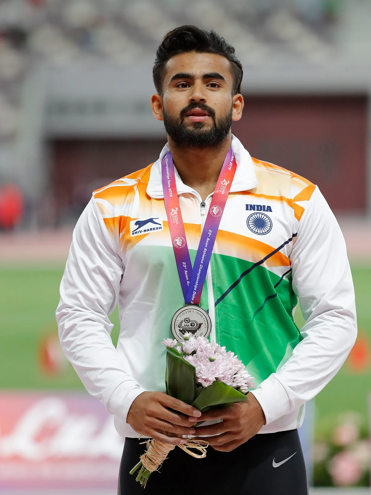Shivpal Singh celebrates after winning the silver medal for the men’s javelin throw.