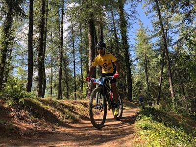Shimla: Cyclist in action as he takes part in 8th edition of Hero MTB Himalaya Shimla 2019, in Shimla, on April 21, 2019. (Photo: IANS)
