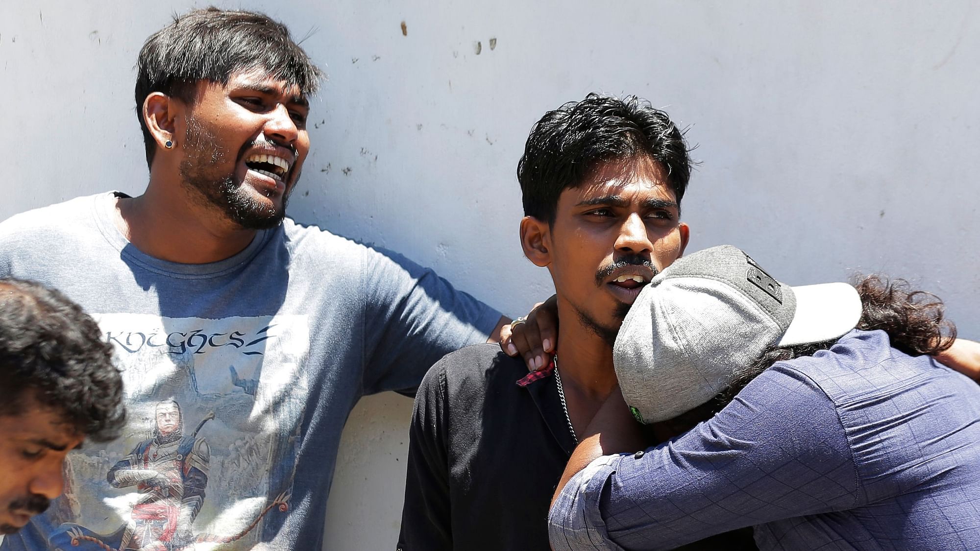 Relatives of people killed in Church blasts mourn as they wait outside mortuary of a hospital in Colombo, Sri Lanka, 21 April 2019.