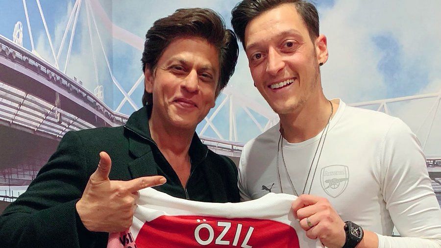 Shah Rukh Khan attended a Arsenal match against Newcastle in London where he met Mesut Ozil.