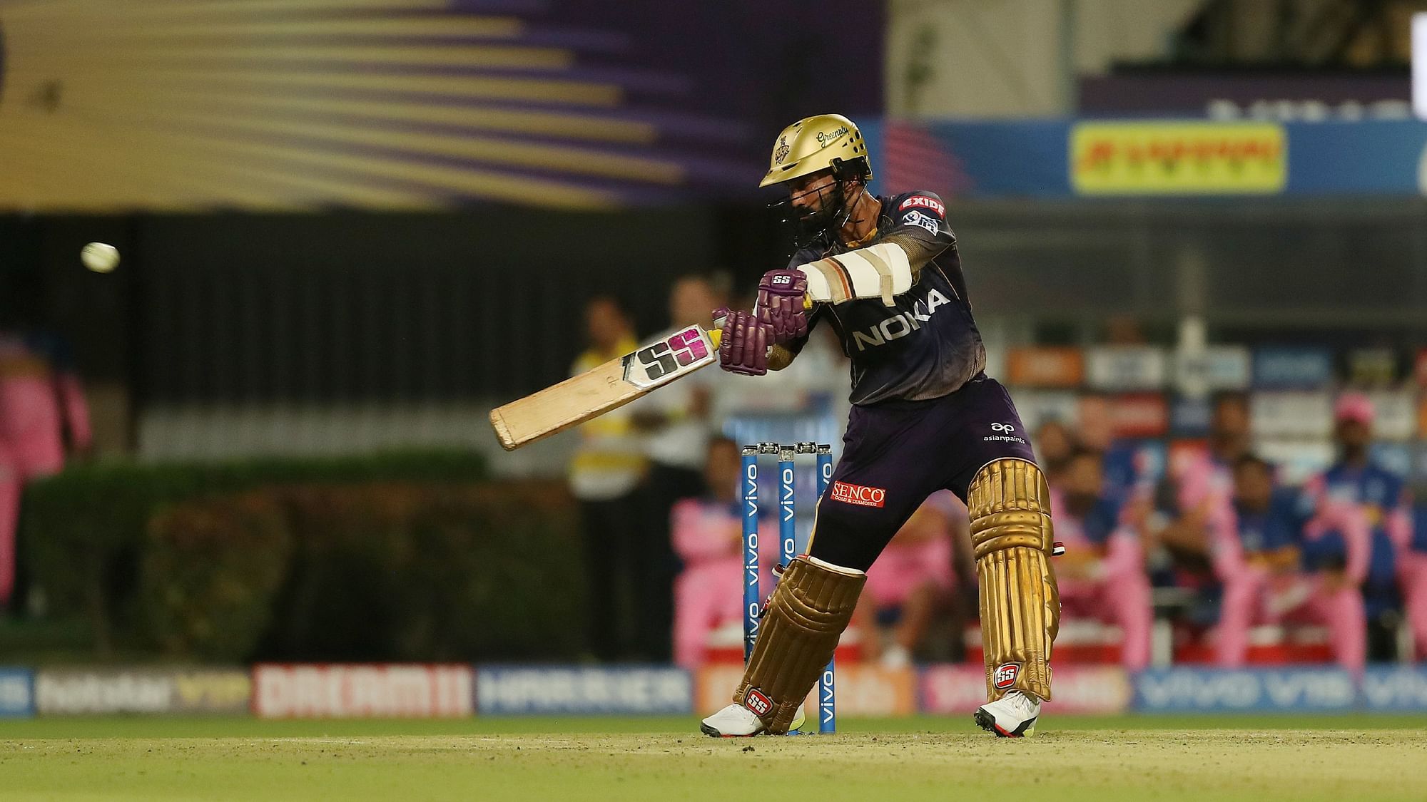 Dinesh Karthik promoted himself to No. 4 and smashed nine sixes and seven fours in his 50-ball unbeaten knock of 97.