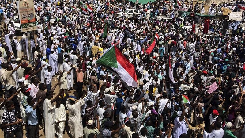 Demonstrators gather in Sudan’s capital of Khartoum, Friday, April 12, 2019.