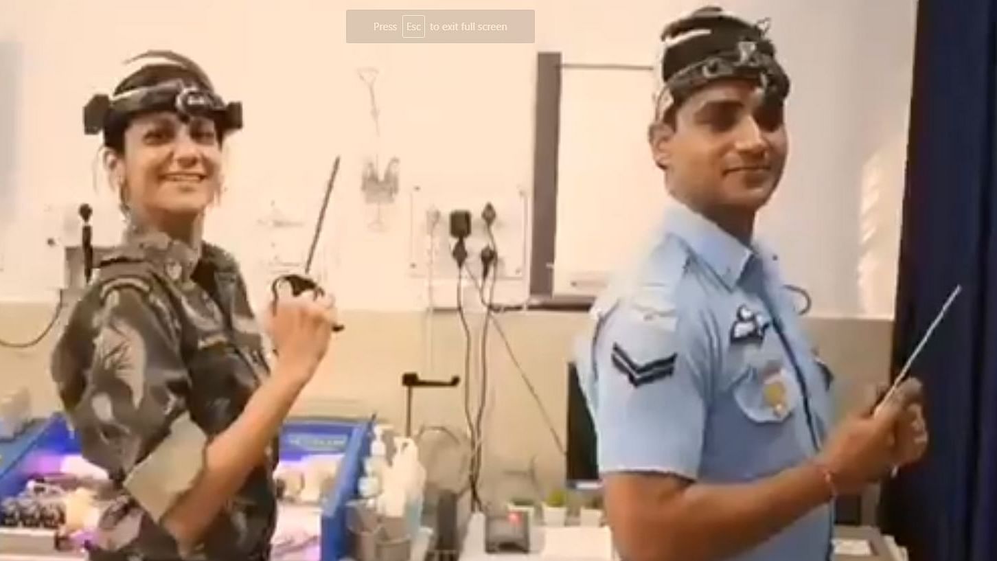 Military doctors and nursing staff tapping away to Pharrell Williams’ viral song “Happy” is happiness!
