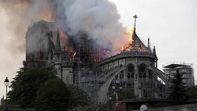The Notre Dame Cathedral on fire in central Paris.
