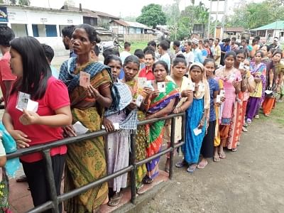 Darjeeling (West Bengal):Voters wait in a queue to cast their votes for the second phase of the 2019 Lok Sabha elections in West Bengal