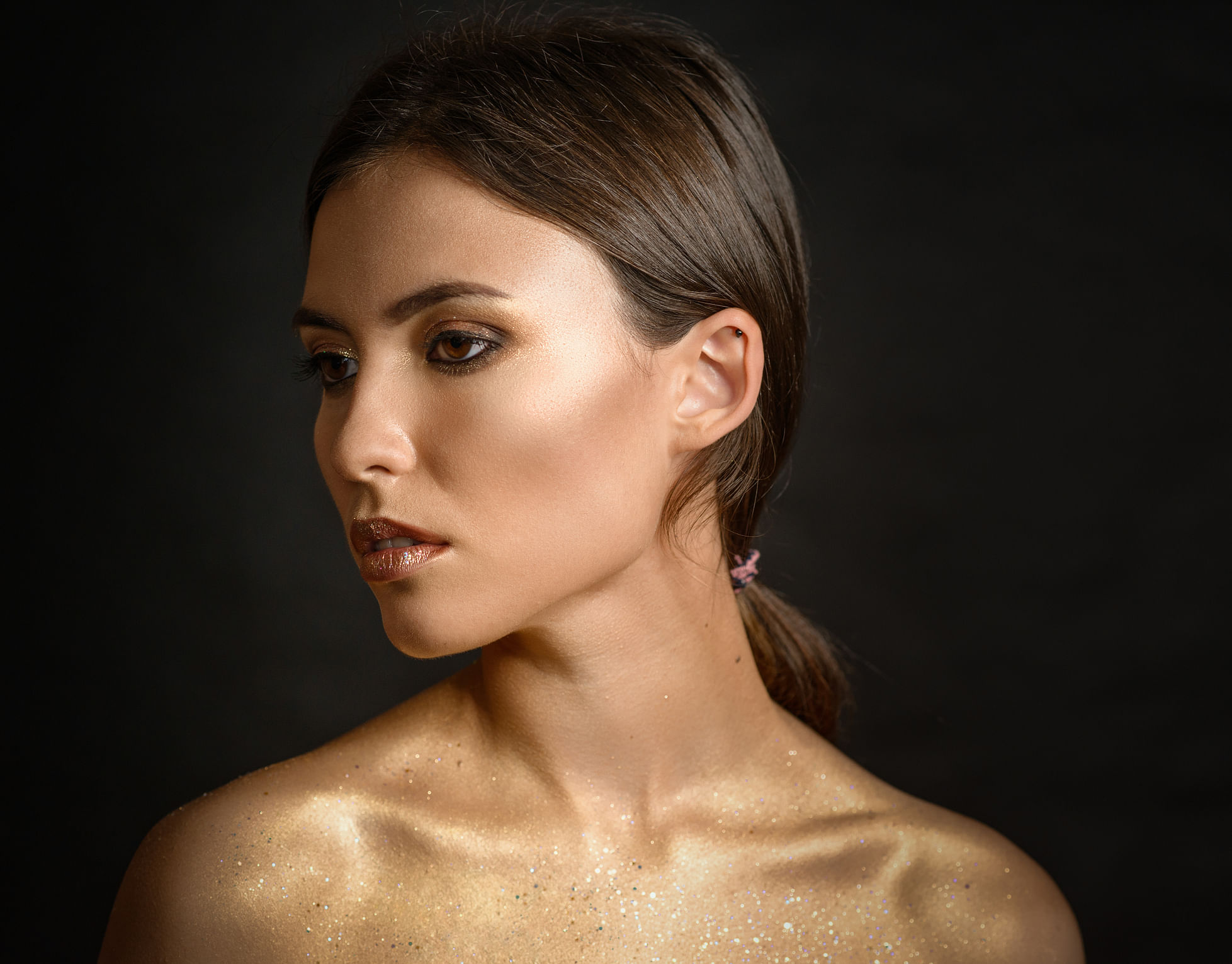 Photo Courtesy:<a href="https://www.istockphoto.com/in/photo/woman-with-golden-makeup-gm848662558-139240493"> istockphotos</a>