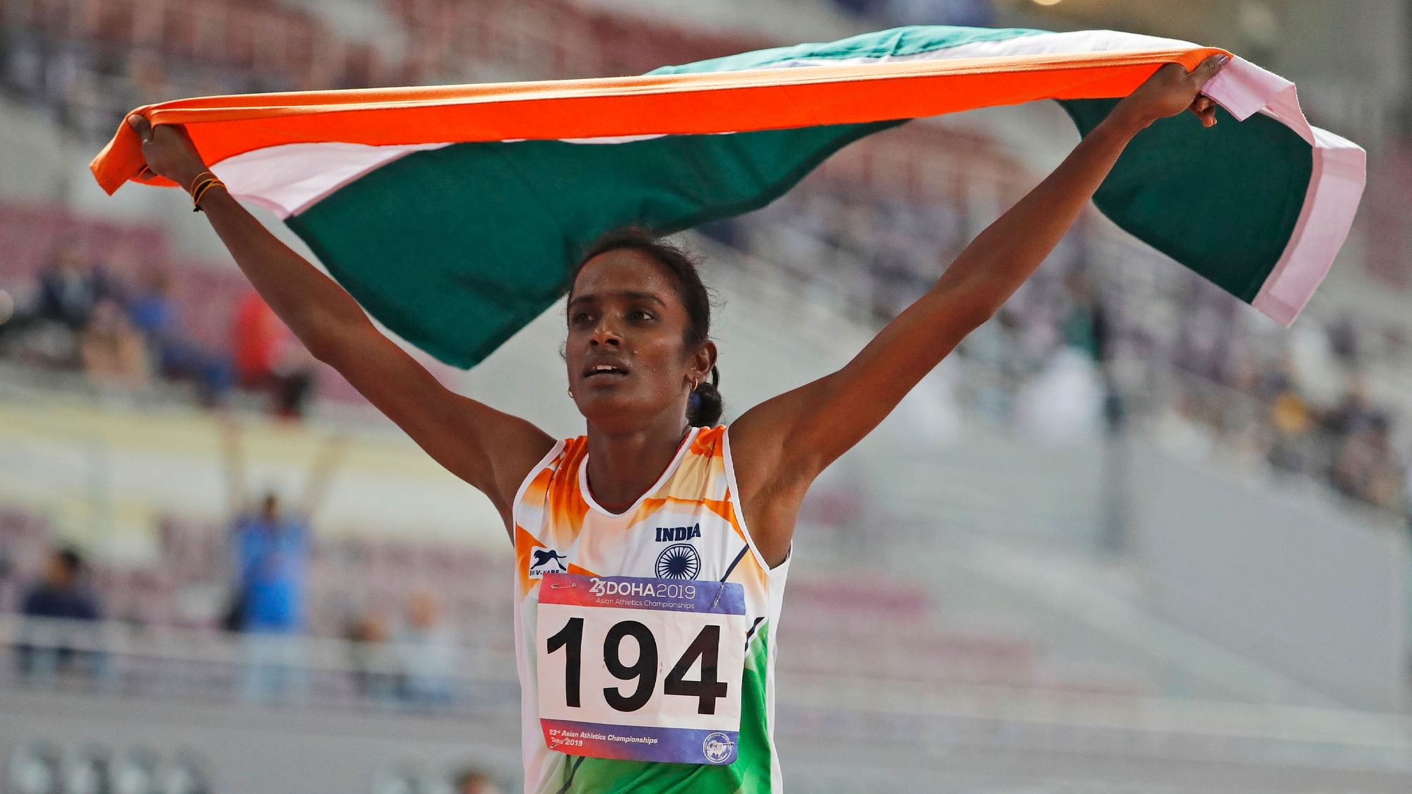 Gomathi Marimuthu celebrates after winning gold in the women’s 800-meters final race at the Asian Athletics Championships in Doha.