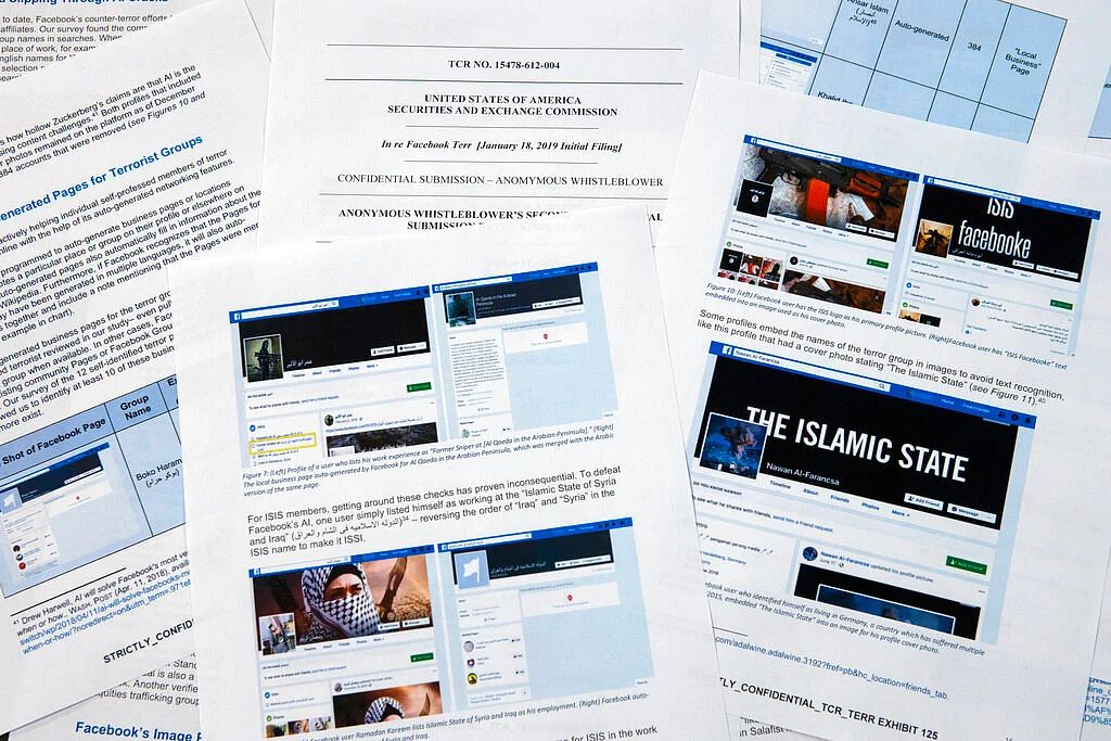 Pages from a confidential whistleblower’s report obtained by The Associated Press are photographed on Tuesday, 7 May 2019, in Washington. 