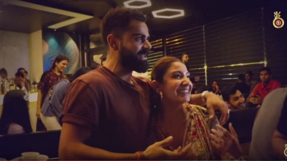 Virat Kohli and Anushka Sharma on a night out with their RCB team-mates in Delhi.