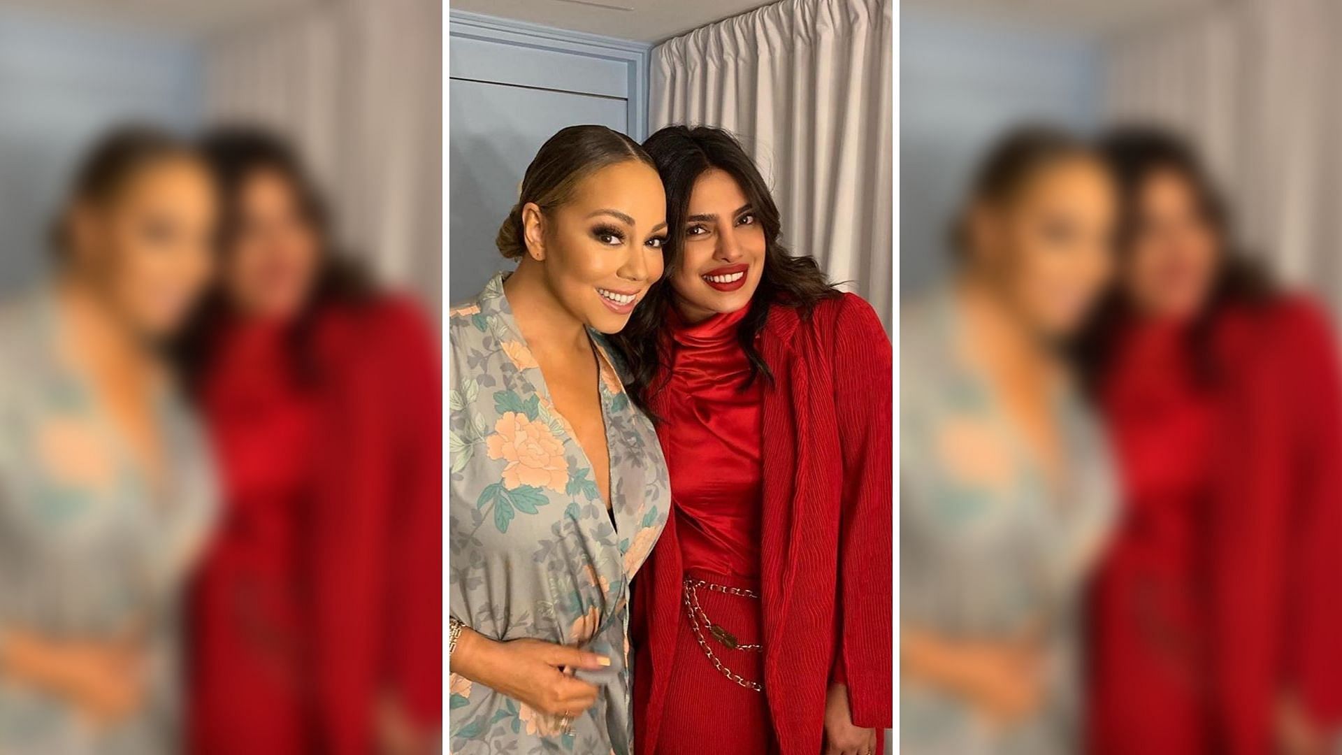 Priyanka Chopra poses with singer Mariah Carey.