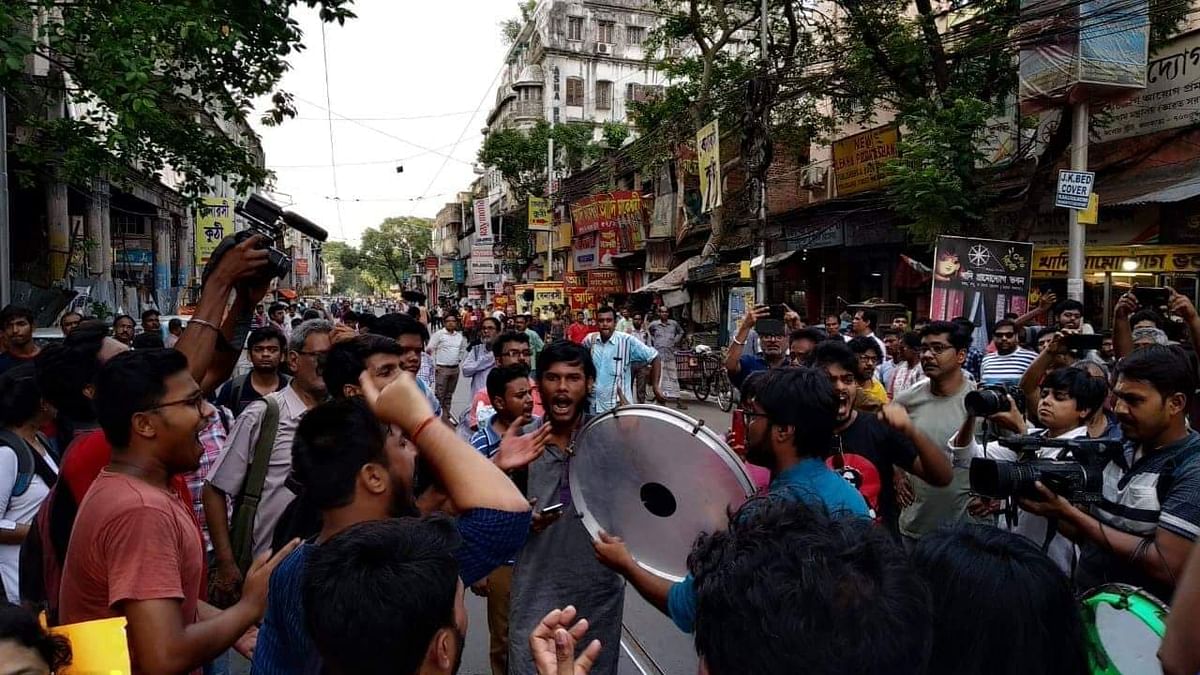 Students & academics rallied through Kolkata streets in protest of the violence and Vidyasagar statue vandalism.