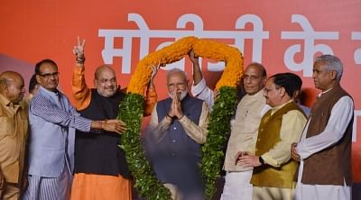 New Delhi: Prime Minister Narendra Modi addresses at BJP headquarters in New Delhi on May 23, 2019. Also seen BJP chief Amit Shah with party leaders Shivraj Singh Chouhan, Thawar Chand Gehlot, Rajnath Singh, Jap Nadda and Ram Lal. (Photo: IANS)