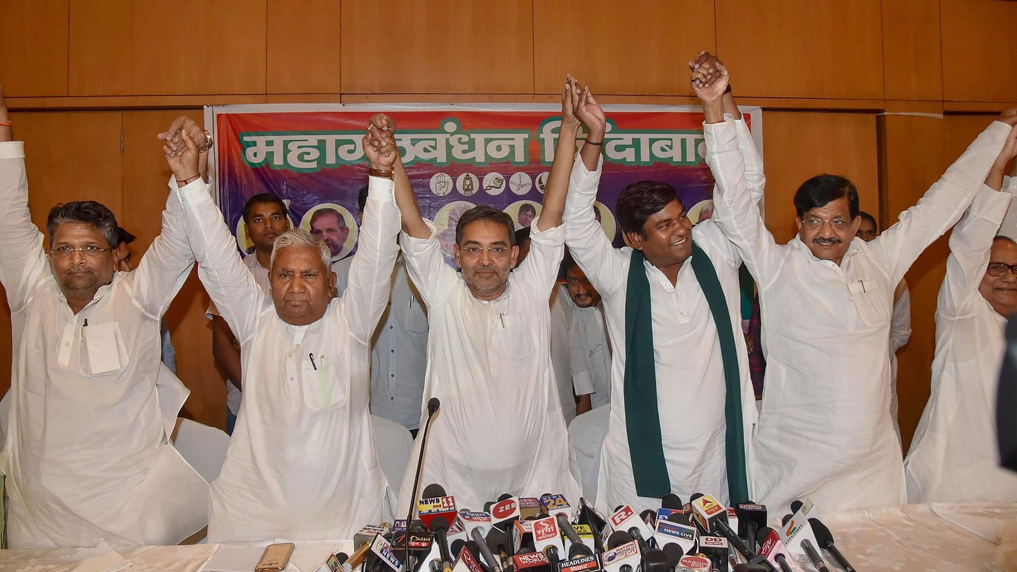 RLSP’s Upendra Kushwaha, RJD’s Ram Chandra Purve, VIP’s Mukesh Sahani and others during a press conference in Patna.