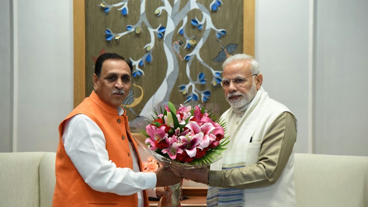 File Photi: Gujarat Chief Minister Vijay Rupani with Prime Minister Narendra Modi.
