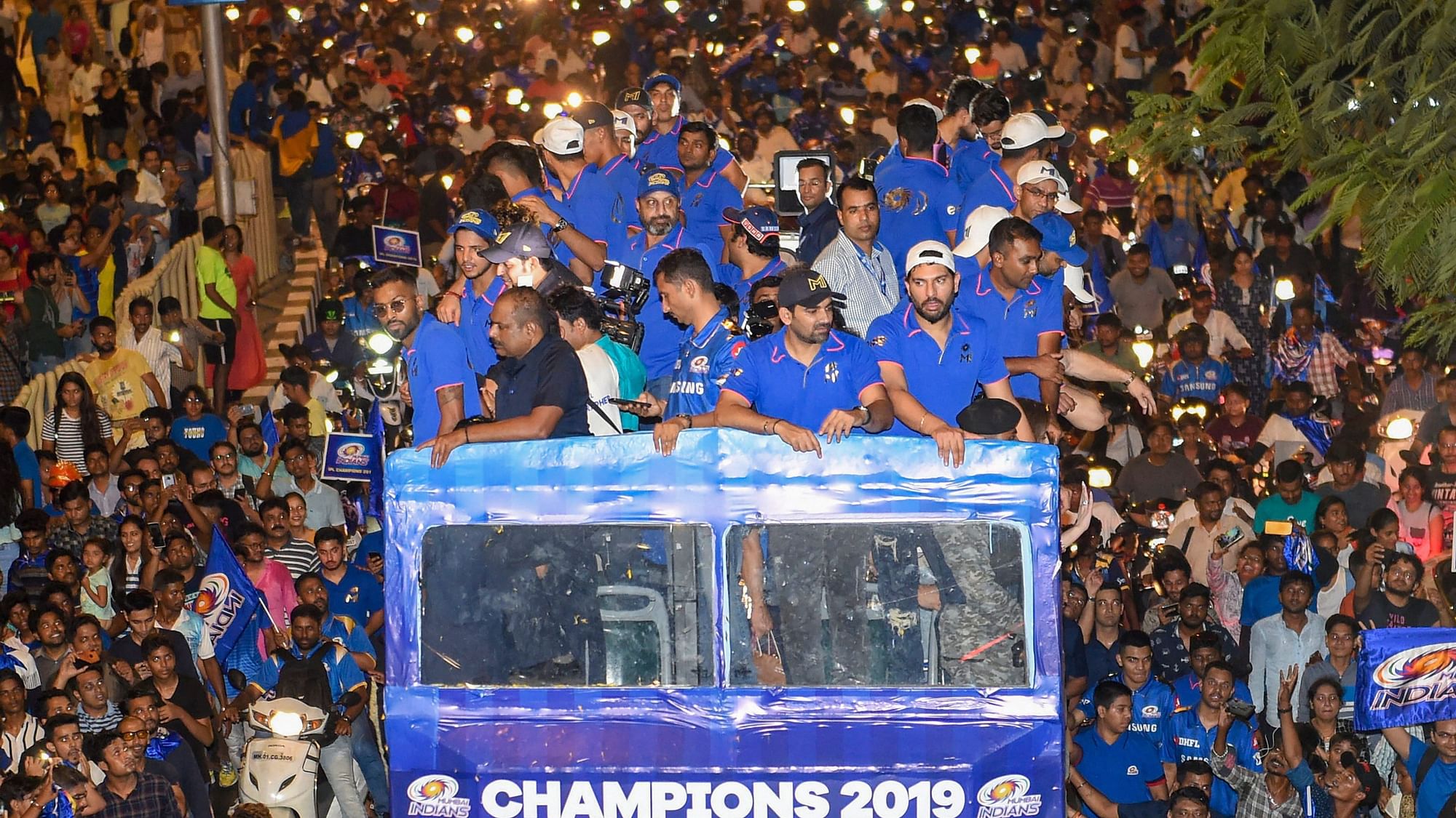 Mumbai Indians celebrate IPL 2019 title with an open bus parade in Mumbai.