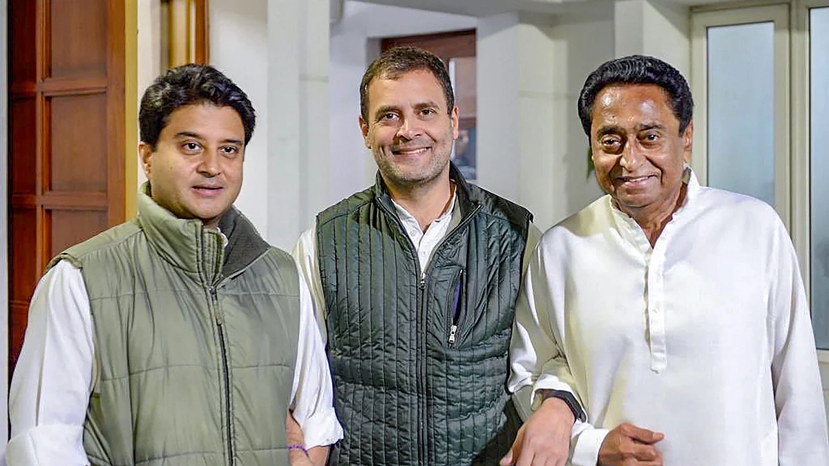 Congress President Rahul Gandhi flanked by Madhya Pradesh Congress leaders Jyotiraditya Scindia.