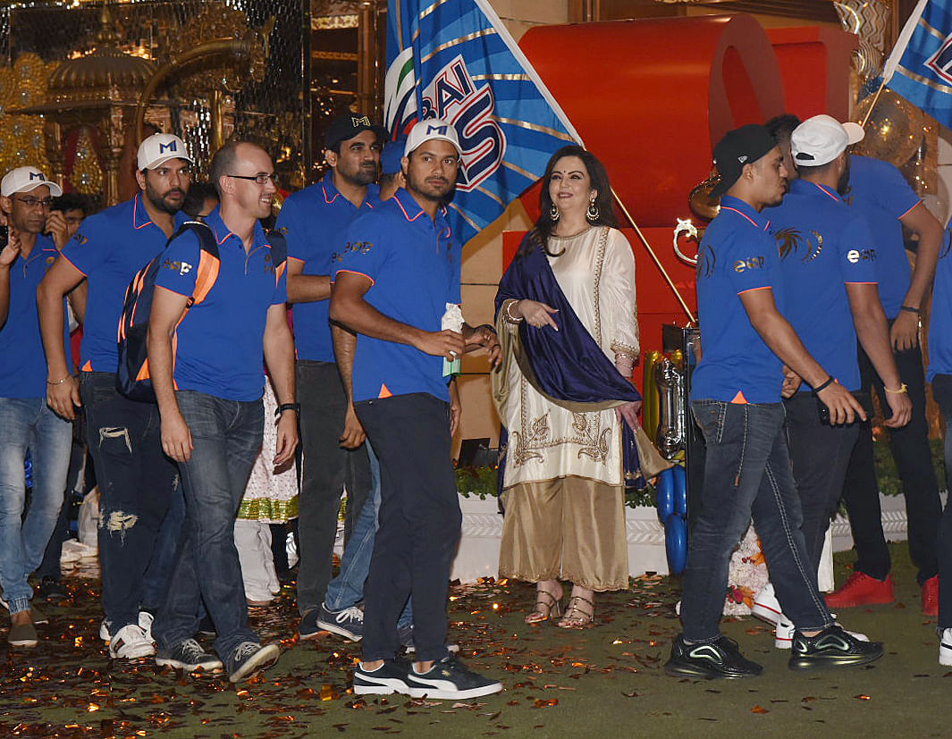 In pictures: Mumbai Indians celebrate IPL 2019 title with an open bus parade in Mumbai.