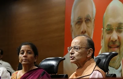 New Delhi: Arun Jaitley and Nirmala Sitharaman address a press conference at the BJP HQ 