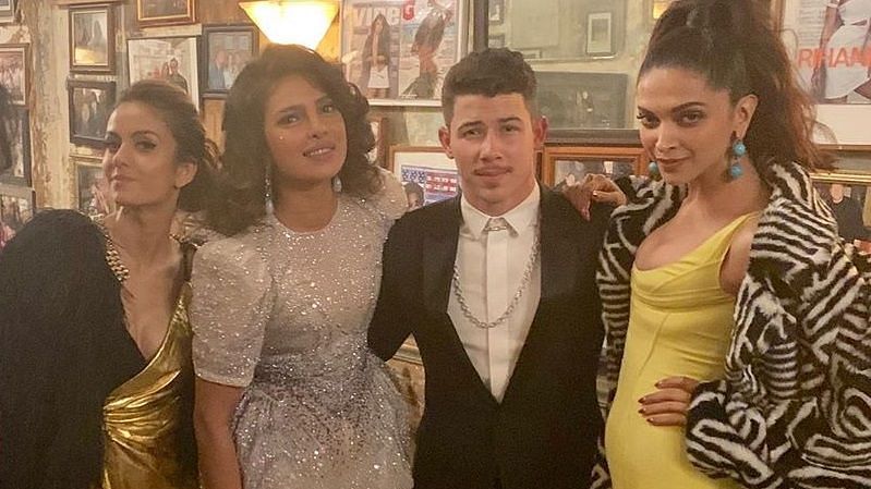 Priyanka Chopra, Nick Jonas and Deepika Padukone at the Met Gala after party.&nbsp;