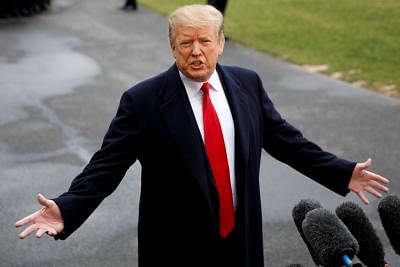 WASHINGTON, March 22, 2019 (Xinhua) -- U.S. President Donald Trump speaks to reporters on the South Lawn before departing from the White House in Washington D.C., the United States, March 22, 2019. Donald Trump said Friday he has "no idea" about when Special Counsel Robert Mueller, who