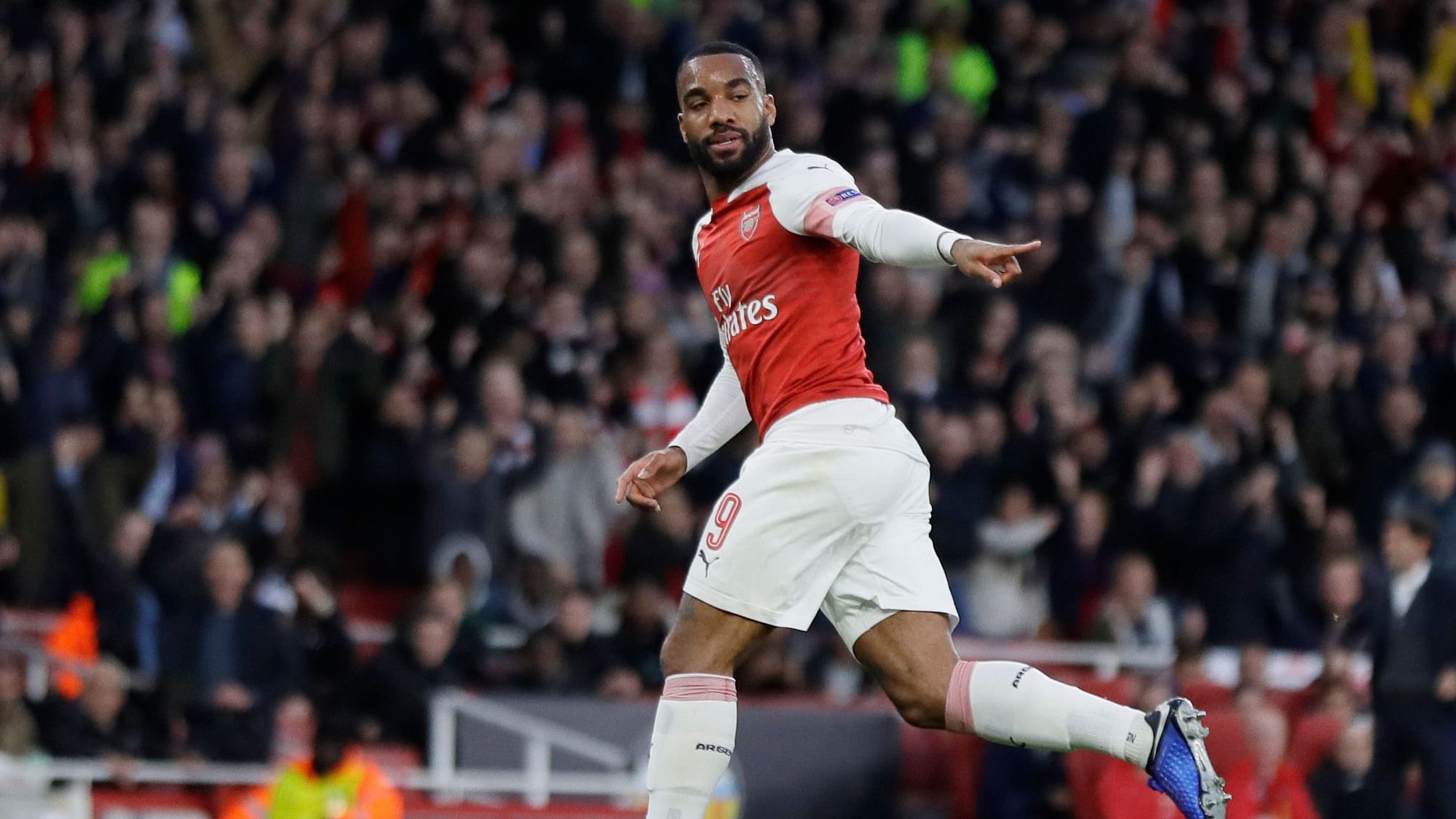 Arsenal’s Alexandre Lacazette celebrates after scoring his first goal.