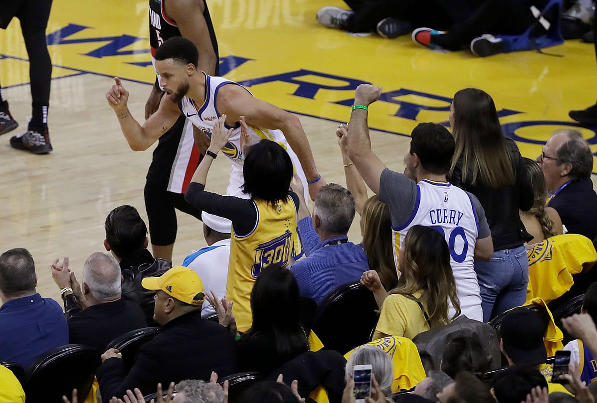 Steph Curry knocked down nine 3-pointers, leading Golden State Warriors past the Trail Blazers 116-94 in Game 1.