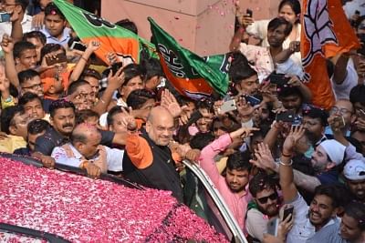 New Delhi: BJP chief Amit Shah joins victory celebrations at the party